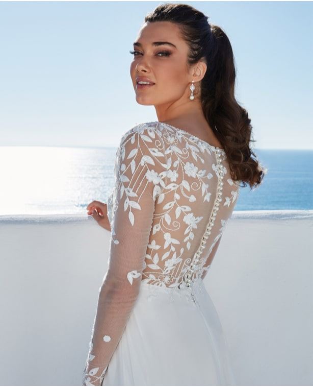 Model wearing a Justin Alexander Classic Elegance