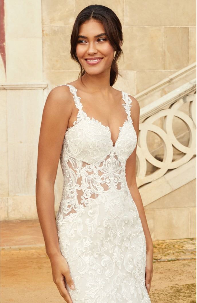 Model wearing a sweetheart gown