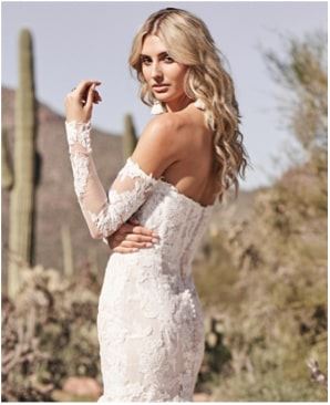 Model wearing a Lillian West gown