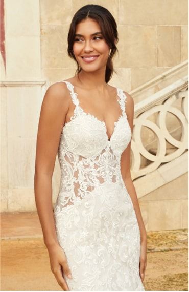 Model wearing a sweetheart gown